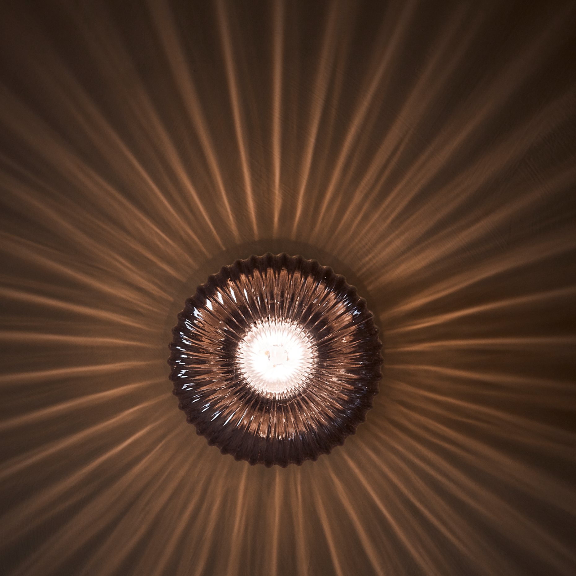 sun shaped wall lamp